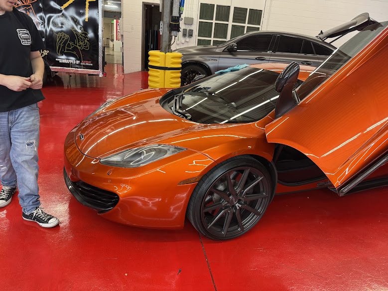 Black sports car with premium window tint